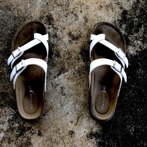 Selling white saindalls